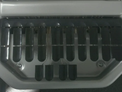 Close-up of a stenotype machine keyboard